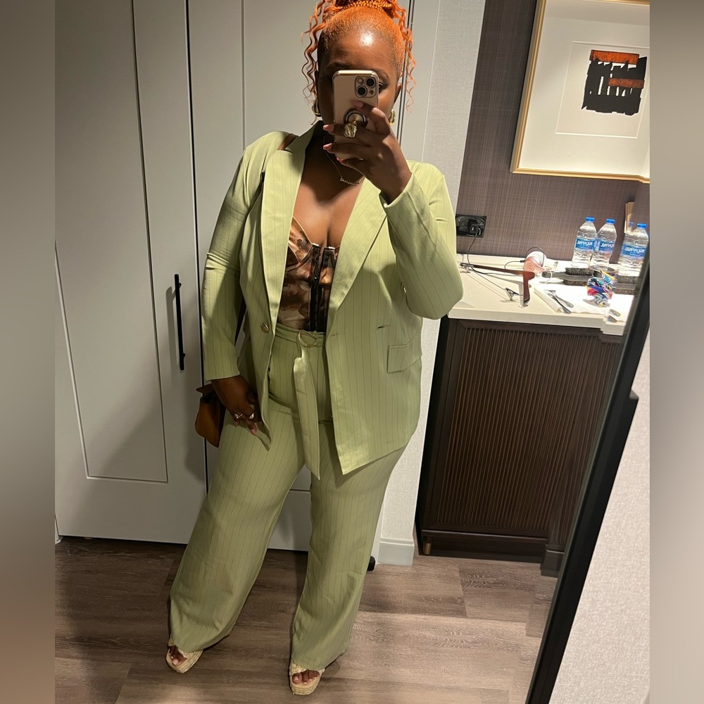 Green pinstriped pants suit
